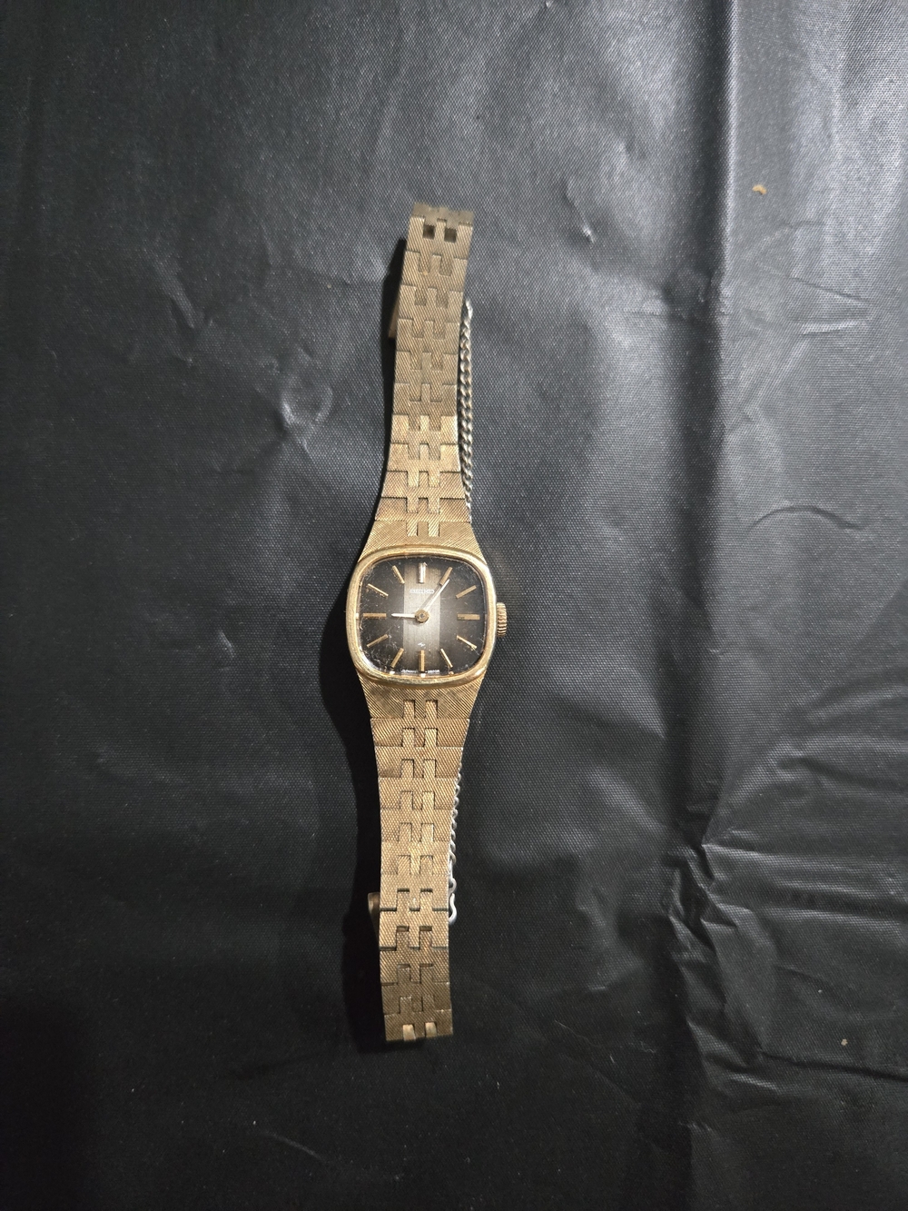 Seiko Gold Tone Ladies Analog Bracelet Watch with Black Dial